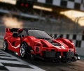 Aerodynamiczny model klockowego samochodu sportowego z niskim zawieszeniem i spoilerem na torze wyścigowym